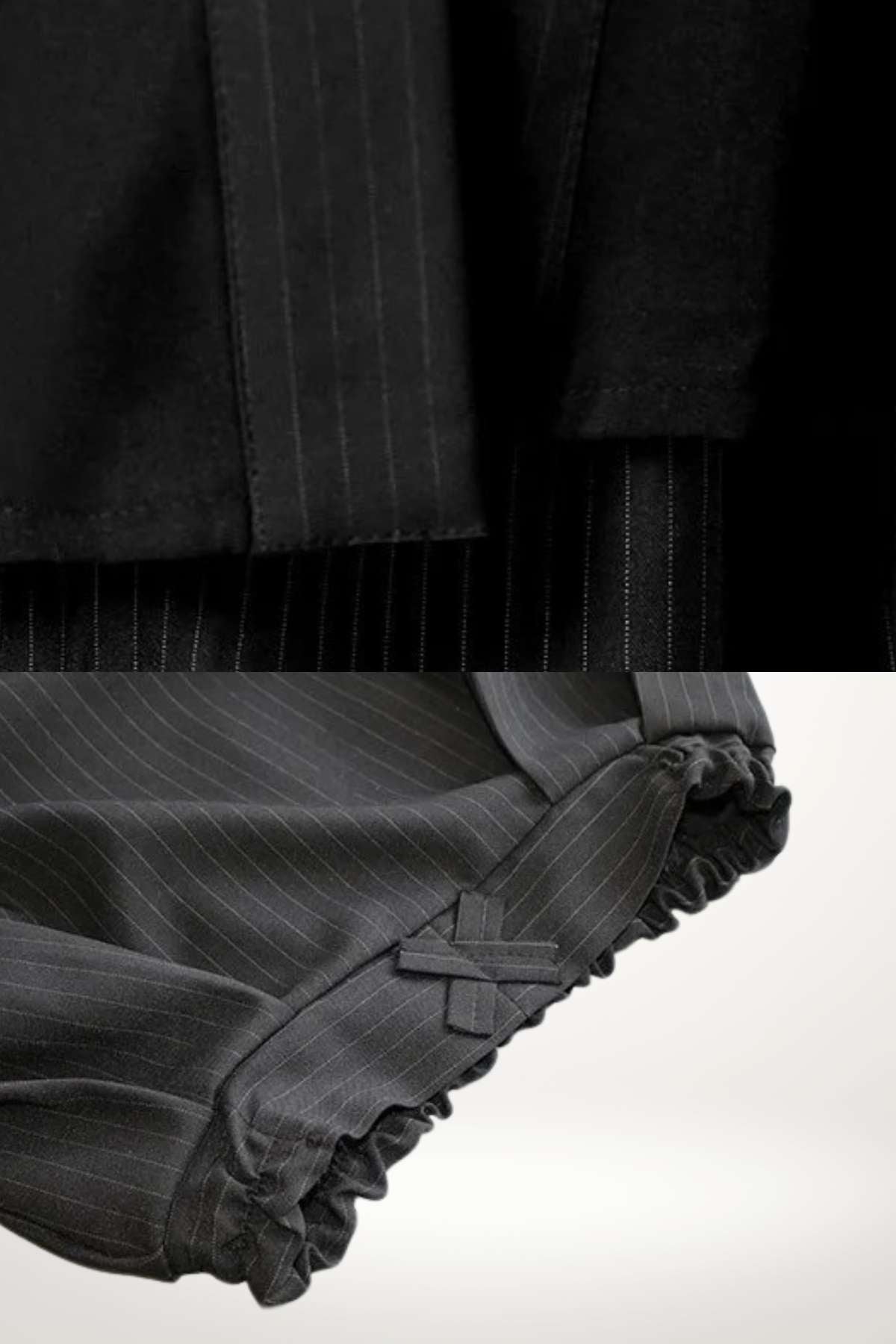 Détail d'un kimono enfant traditionnel noir avec des rayures fines et des finitions froncées sur les manches