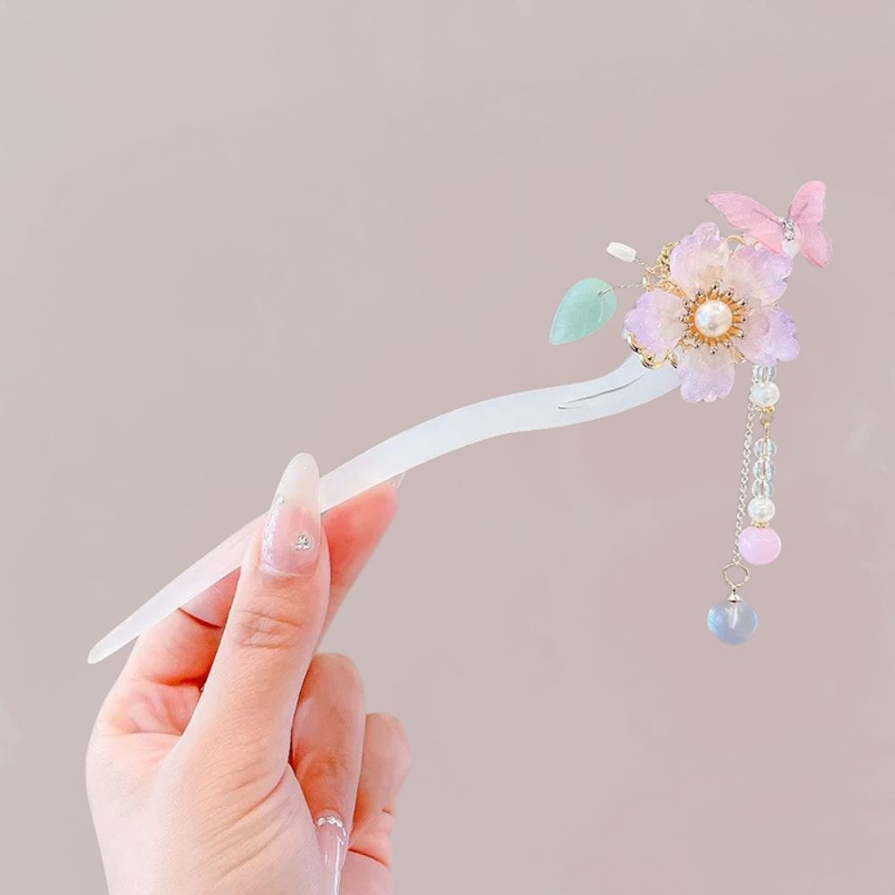 Ornement de cheveux en forme de peigne, décoré de fleurs pastel et d'un papillon délicat