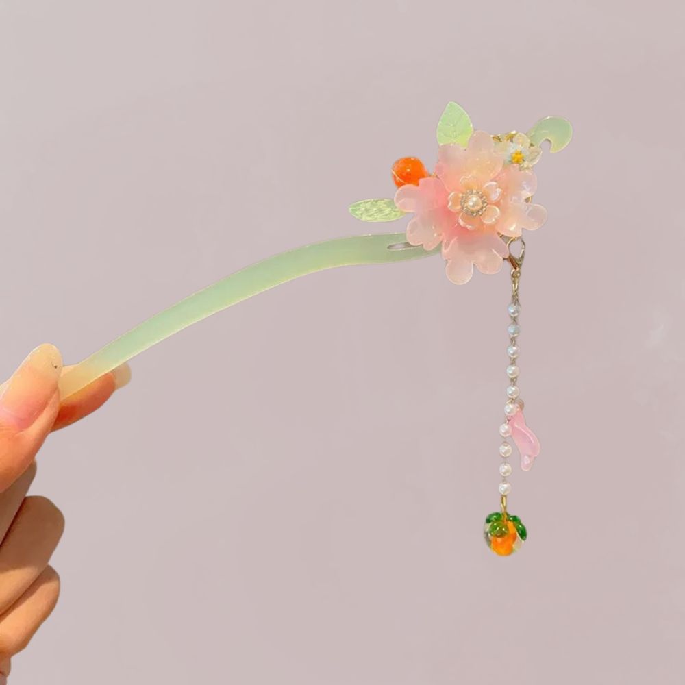 Peigne en plastique vert transparent décoré d'une fleur rose, perles de verre et pendentif en forme de fruit