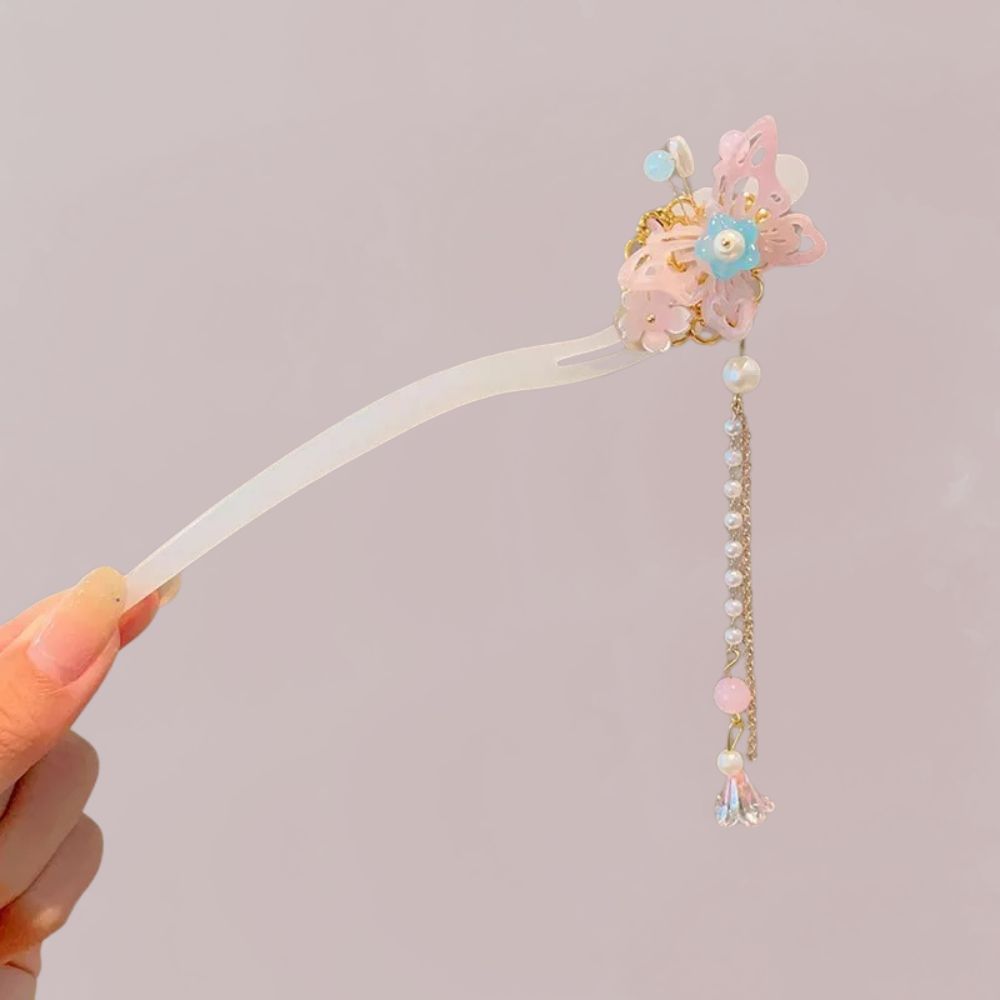 Peigne en plastique transparent décoré de fleurs roses et d'un papillon, agrémenté de perles brillantes