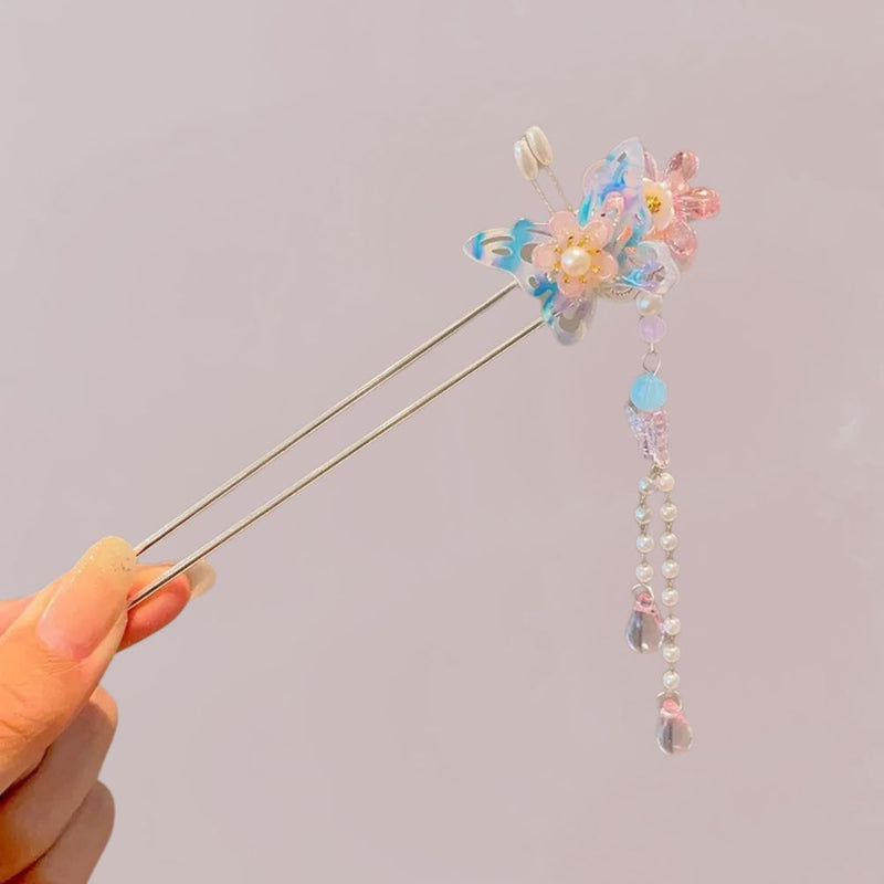 Accessoire de cheveux en métal argenté avec papillon bleu, fleurs roses et gouttes de verre colorées