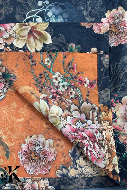 Un kimono élégant avec des motifs floraux colorés sur un fond noir et orange, en tissu doux et lumineux