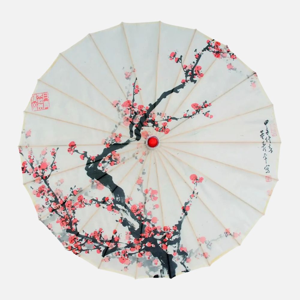 Ombrelle anti-UV beige ornée de fleurs roses et d'une branche noire, avec un bouton rouge au centre
