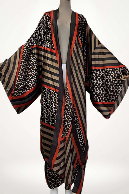 Cardigan kimono femme long en satin aux motifs géométriques noirs et rouges, coupe fluide et élégante pour un look chic et moderne
