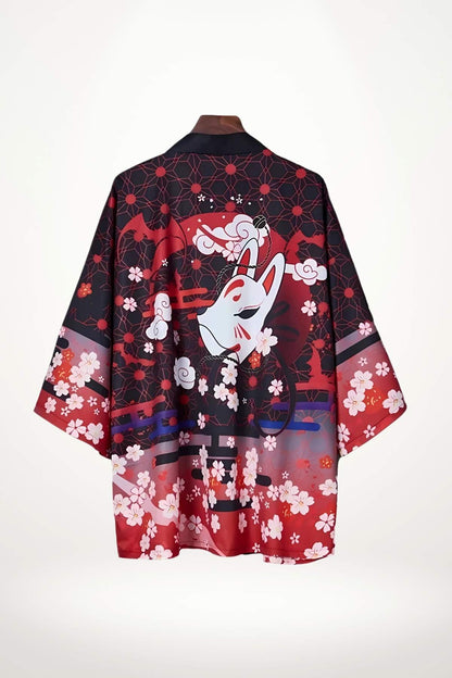 Haut kimono femme en satin rouge avec motifs floraux et visage de renard sur fond noir
