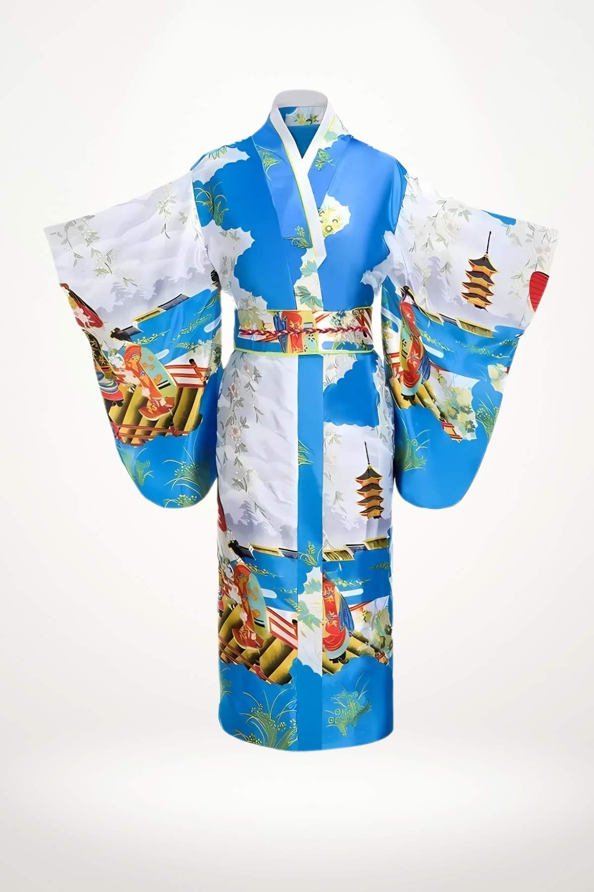 Femme debout en kimono long lake blue en satin orné de motifs japonais de geishas et pagodes, ceinture obi tressée.
