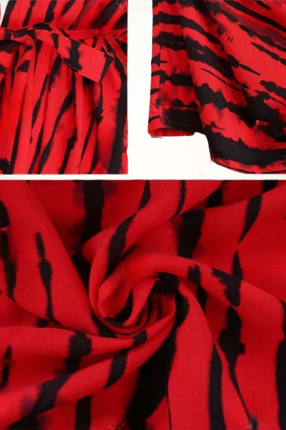 Tissu léger de kimono rouge avec des motifs noirs en rayures, idéal pour un style bohème à la plage