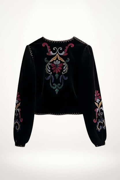 Kimono femme en velours noir brodé de motifs floraux multicolores, manches longues et finition satinée.