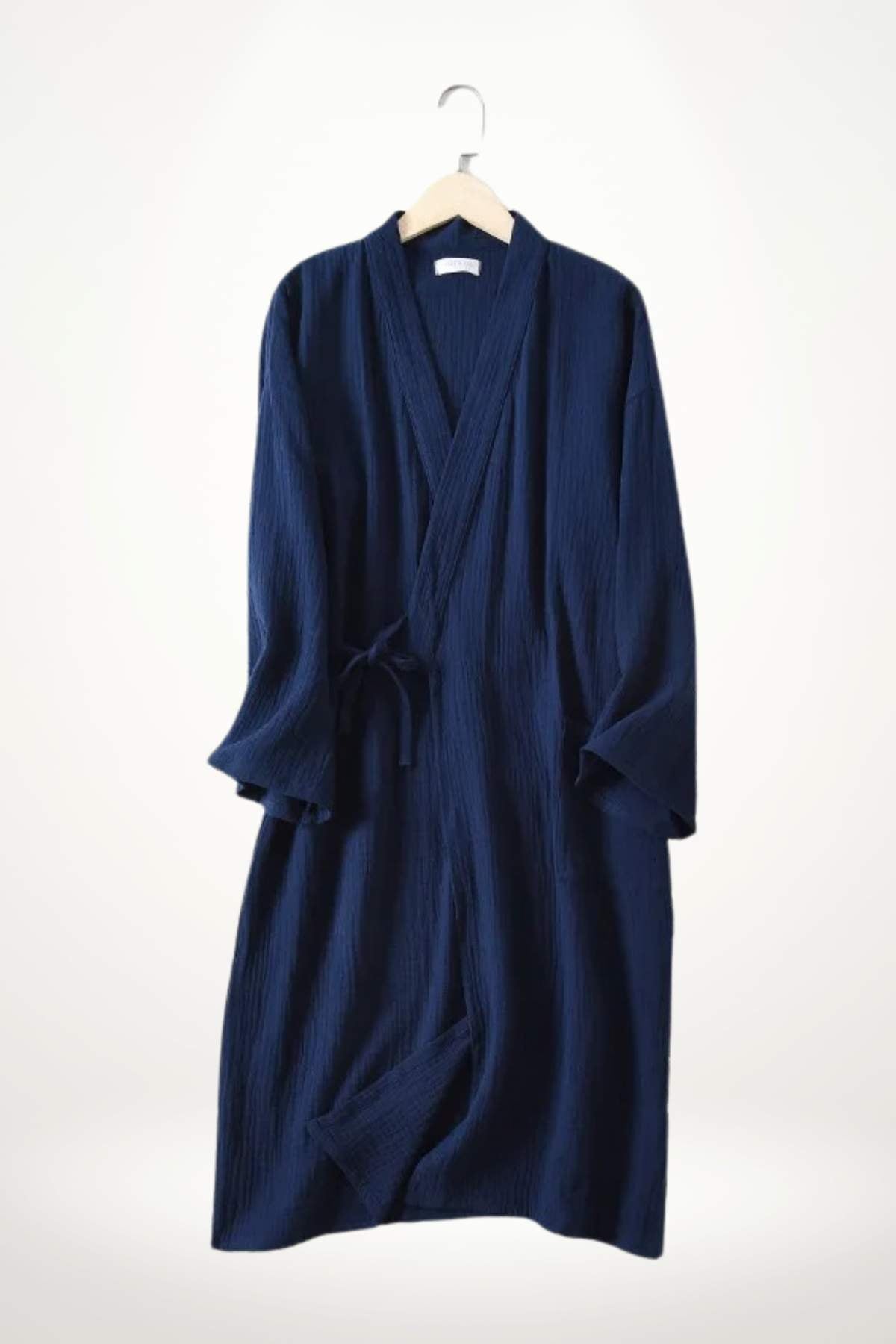 Peignoir kimono femme en tissu bleu marine, avec des manches larges et une ceinture à nouer