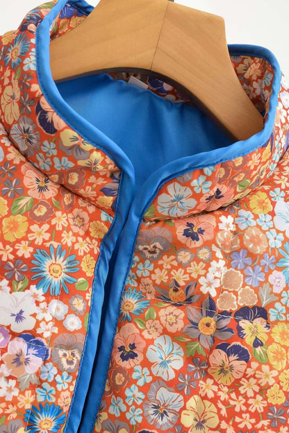 Veste kimono matelassée femme imprimé Liberty corail bleu, doublure satin, polyester rayonne acétate, col mao, fermoirs crochets métalliques.