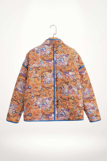 Veste kimono matelassée femme imprimé Liberty corail bleu, doublure satin, polyester rayonne acétate, col mao, fermoirs crochets métalliques.