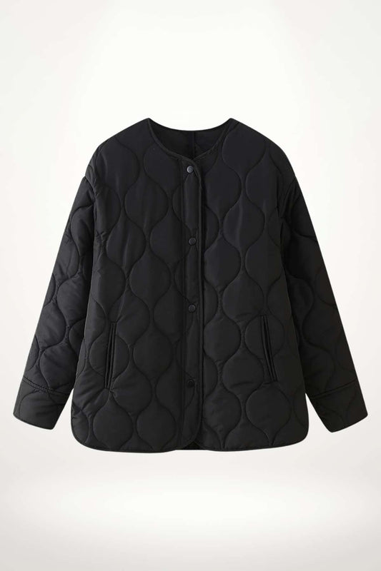 Veste kimono femme matelassée noire en polyester avec quilting circulaire, coupe droite et col rond.
